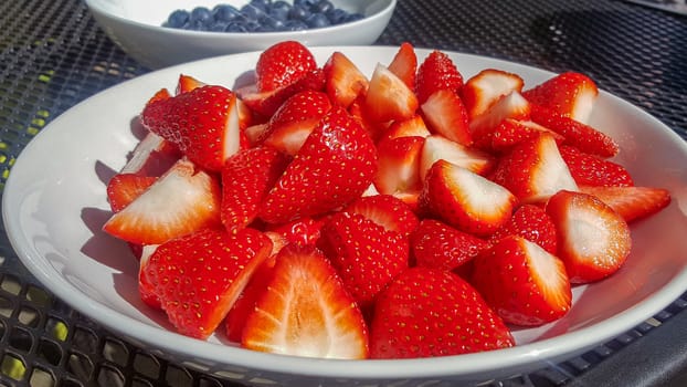 Large bowl of fresh ripe strawberries