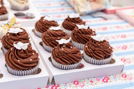 Homemade chocolate cupcakes on a market stall