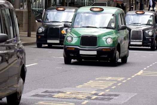 Four London Taxi Cabs