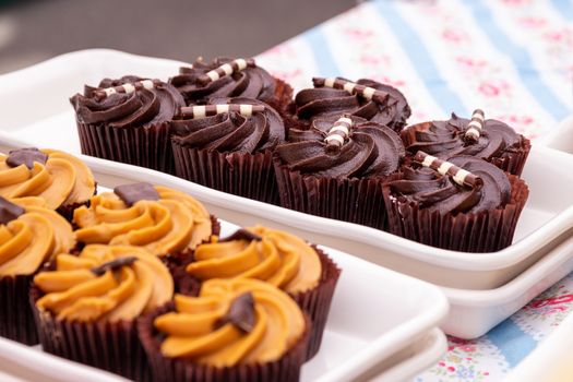 Homemade chocolate cupcakes on a market stall