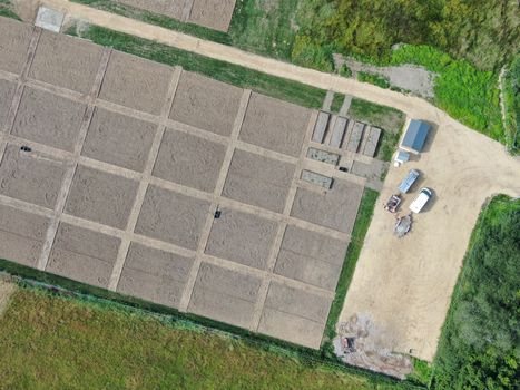 a view of recently laid out allotments pre-planting form directly overhead showing borders and bare earth
