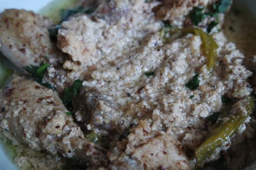 Homemade chicken qorma or white qorma dish. Traditional dish for parties and ceremonial purpose popular in South Asian countries like Pakistan, India and Bangladesh