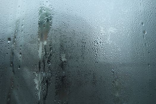 Bright grey color glassy texture, with water drops on it. Water drop glassy background