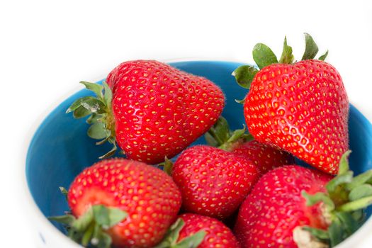 A bowl of juicy, ripe strawberries (Fragaria × ananassa)