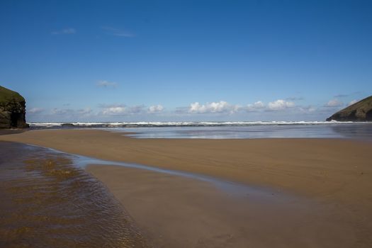 Sweeping vista of Mawgan Porth Beach, North Cornwall, England