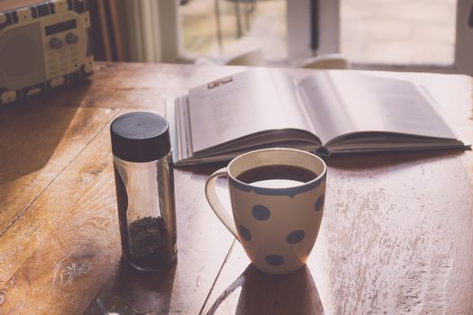 Drinking coffee in the kitchen