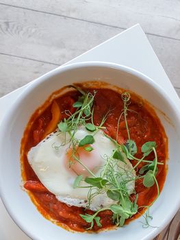 Shakshuka is a combination of eggs, tomatoes, and spices, popular across the Middle East and North Africa