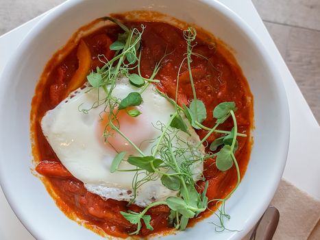 Shakshuka is a combination of eggs, tomatoes, and spices, popular across the Middle East and North Africa