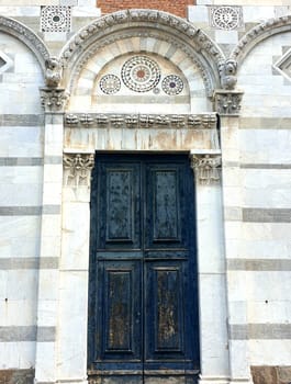 Particular of the facade of the Church of San Paolo all'Orto in Pisa, Tuscany, in a beautiful summer day