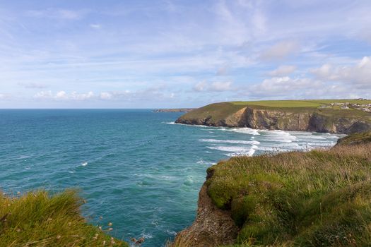 A landscape view of Mawgan Porth from the South West Coast Path, North Cornwall along the Atlantic coast near Newquay