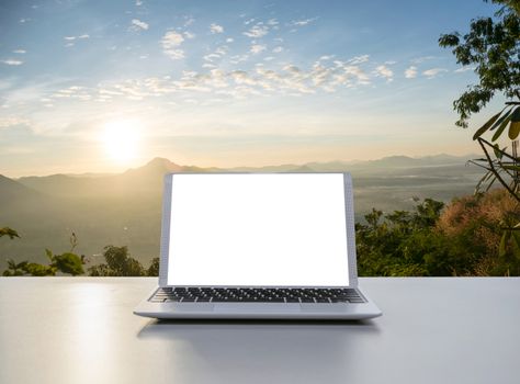 Notebook Laptop in the office The background nature and mountains