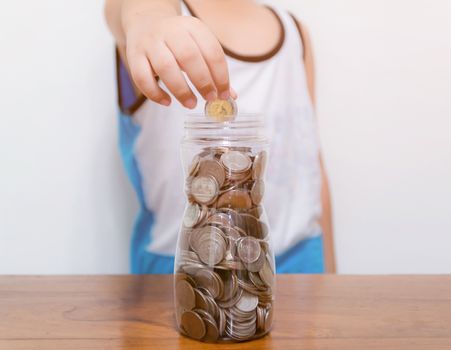 Child collect saving money for the future