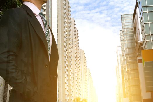 businessman leadership wearing in a city with buildings looking at city skyline at sunset the concept of modern life business