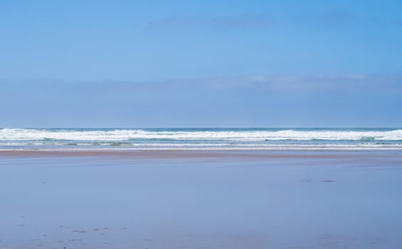 Sea, surf and sand of Mawgan Porth beach, Cornwall, UK