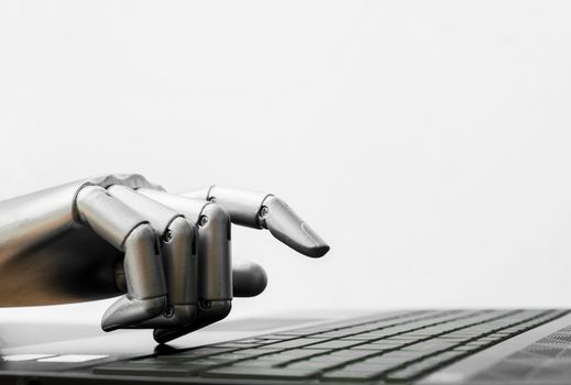 Robot concept or robot hand chatbot pressing computer keyboard enter