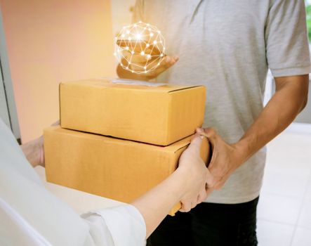 Technology delivery staff uniform handing a parcel box receiving parcel from delivery