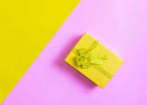 Gift box on festival day yellow and pink background