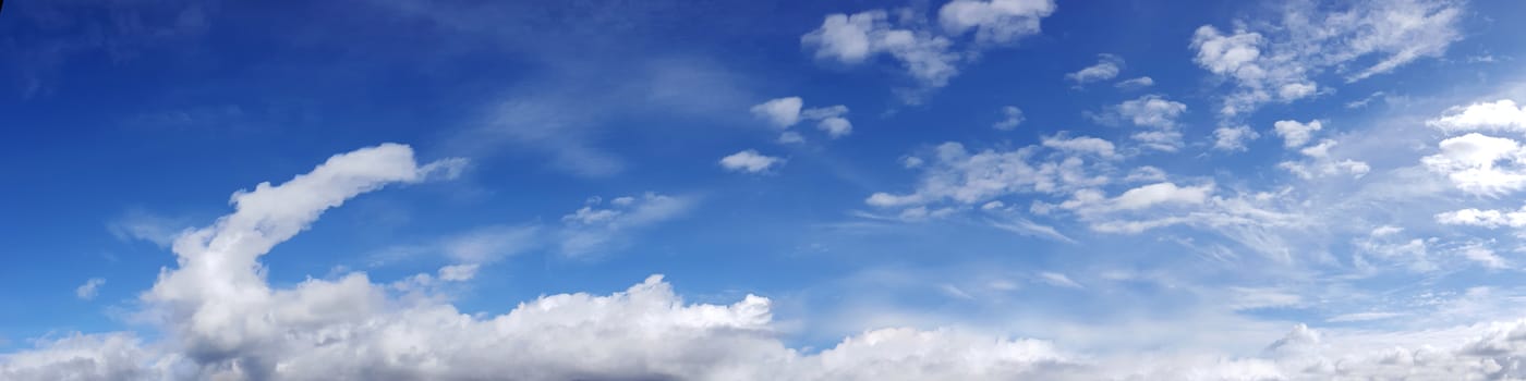 Vibrant color panoramic sky with cloud on a sunny day. Beautiful cirrus cloud. Panorama high resolution photograph.