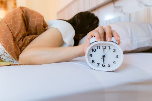 Alarm clock that wakes up in the morning in the bedroom