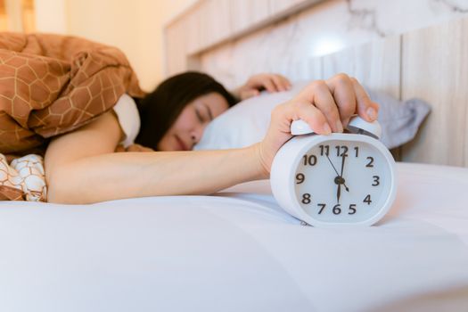 Alarm clock that wakes up in the morning in the bedroom
