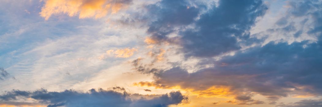 Vibrant panorama sunset sky on twilight time. Beautiful cirrus cloud. Panoramic image