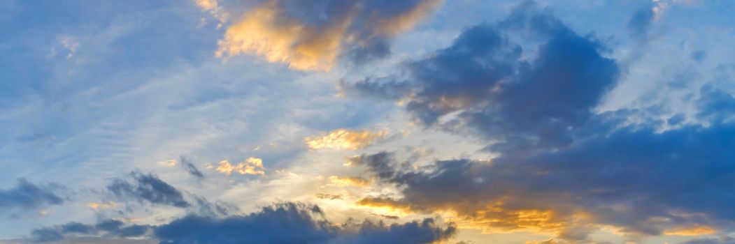 Vibrant panorama sunset sky on twilight time. Beautiful cirrus cloud. Panoramic image