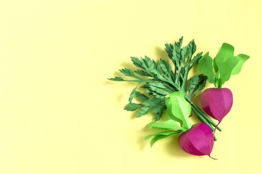 Colorful paper radish and parsley. Real volumetric handmade paper objects. Paper art and craft