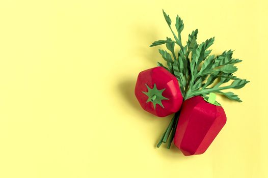 Colorful tomato, pepper and parsley on yellow background. Real volumetric handmade paper objects. Paper art and craft