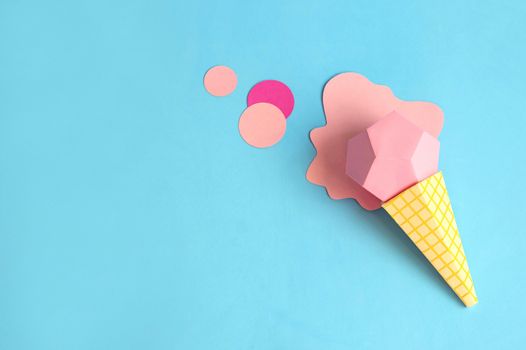 Ice cream in cone made of paper. Real volumetric handmade paper objects. Paper art and craft