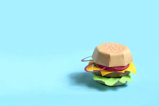Hamburger made of paper. Real volumetric handmade paper objects. Paper art and craft