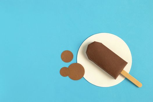Chocolate popsicle made of paper. Real volumetric handmade paper objects. Paper art and craft