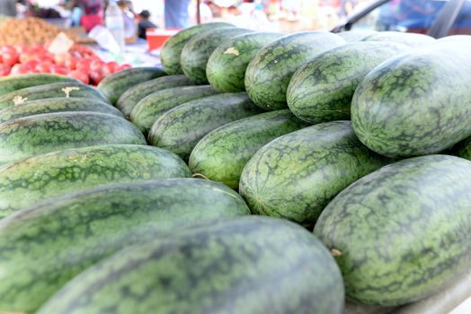 Many fresh watermelons, Thai tropical fruits that nutrition for sell in the market.