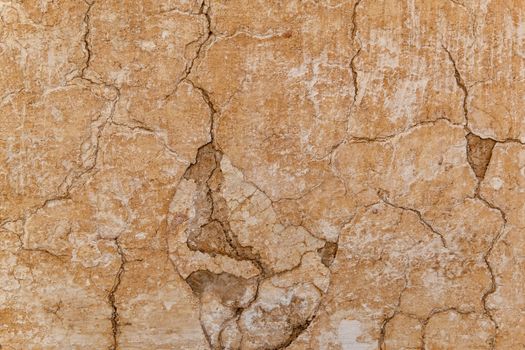 Brown adobe clay wall texture background. Material construction. Architectural detail. Vernacular architecture found in Africa and Asia.