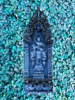 blue sandstone angel and green clover background