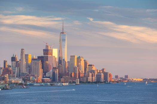 New York City downtown Manhattan sunset skyline panorama view over Hudson River in USA