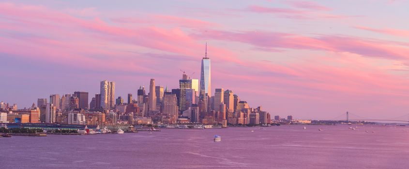 New York City downtown Manhattan sunset skyline panorama view over Hudson River in USA