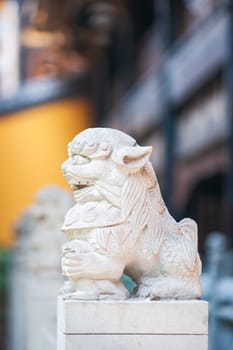 Lion white stone statue in a buddhist temple, Chongqing, China