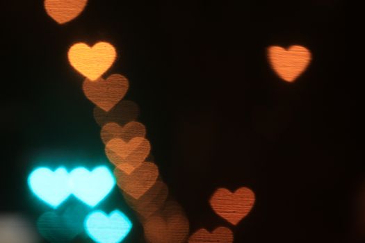 Valentines Colorful heart-shaped on black background lighting bokeh for decoration at night backdrop wallpaper blurred valentine, Love Pictures background, Lighting heart shaped soft at night abstract