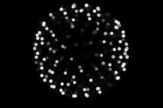 Bokeh of light spheres round, circle on background black