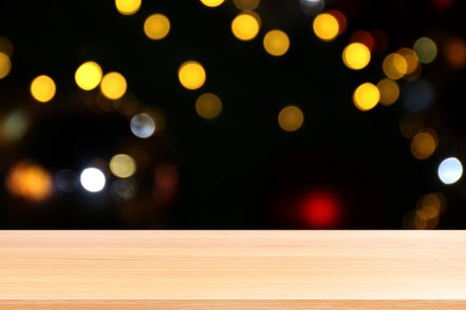 wood plank on colorful bokeh light abstract background, empty wood table floors on abstract bokeh night light multi color background, wood table board empty front colorful bokeh multi color beam light