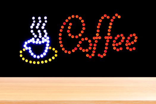 wood plank on coffee shop sign LED bokeh light dark night background, empty wood table floors on coffee shop sign light signage dot colorful, wood table board empty front sign coffee cup neon light
