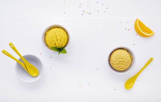 Various of ice cream flavor lemon and orange set up on white wooden background . Summer and Sweet menu concept.