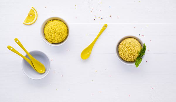 Various of ice cream flavor lemon and orange set up on white wooden background . Summer and Sweet menu concept.