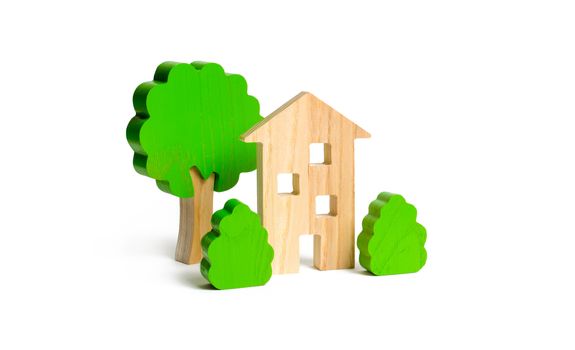 Wooden multi-storey building surrounded by bushes and trees on an isolated background. Urbanism and urban landscaping. Acquisition of affordable housing in a mortgage. Accommodation for young families
