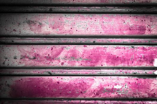 Closeup pink roller shutter texture/abstract background.