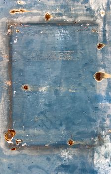 Blue rusty panel texture with grungy frame, ideal for backgrounds.