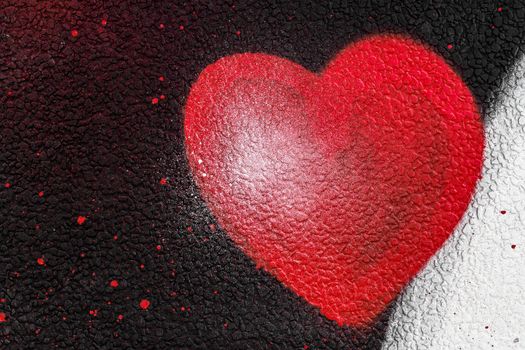 Splash red heart on black and white wall. Grungy element for your design.