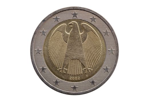 Reverse side of a Two Euro coin of Germany dated 2002 which shows the German eagle cut out and isolated on a white background