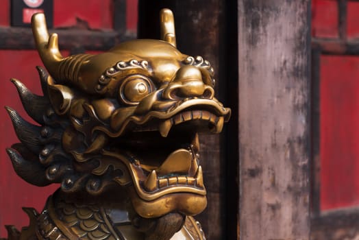 Bronze dragon statue in a chinese buddist temple, Wenshu Monastery, Chengdu, China