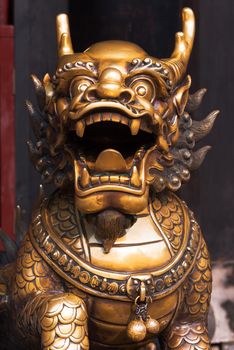 Bronze dragon statue in a chinese buddist temple, Wenshu Monastery, Chengdu, China